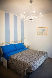 Postel nebo postele na pokoji v ubytování B&B La Milanese