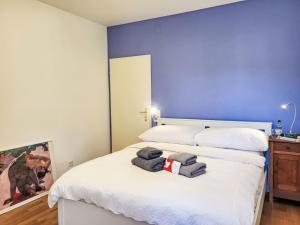 Postel nebo postele na pokoji v ubytování Apartment Apt- Oasis by Interhome