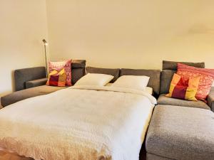 Postel nebo postele na pokoji v ubytování Apartment Apt- Oasis by Interhome