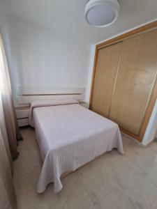 Postel nebo postele na pokoji v ubytování Marina de El Morche