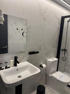 Koupelna v ubytování Hotel DL Urban