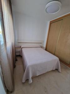 Postel nebo postele na pokoji v ubytování Marina de El Morche