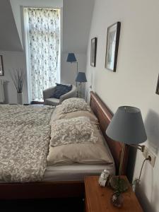 Posteľ alebo postele v izbe v ubytovaní Penzion Platan
