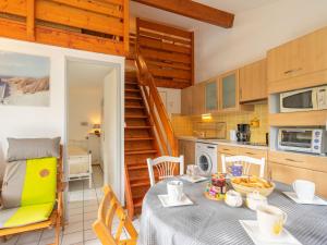 Kuchyň nebo kuchyňský kout v ubytování Holiday Home Bois Soleil-2 by Interhome + 14 fotografií