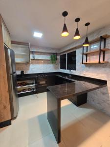 Η κουζίνα ή μικρή κουζίνα στο Apartamento proximo shopping