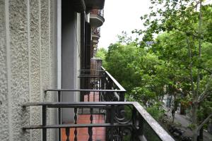 a balcony with a wrought iron railing on a building at Homenfun Barcelona Sants Estación in Barcelona