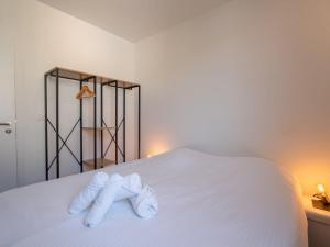 Postel nebo postele na pokoji v ubytování Holiday Home New Dahlia 8 by Interhome