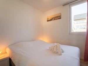 Postel nebo postele na pokoji v ubytování Holiday Home New Dahlia 8 by Interhome