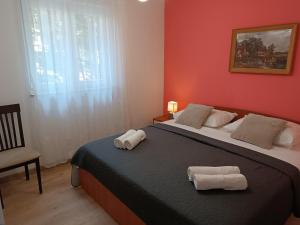 Posteľ alebo postele v izbe v ubytovaní Apartments Mirjana Baška