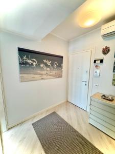 Gambar di galeri bagi Piazza del Sole Apartment- 1 minute walk from the beach- free park di Lignano Sabbiadoro