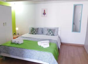 Postel nebo postele na pokoji v ubytování A Casa Di Alice