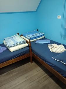 Rúm í herbergi á Vila NATAŠA