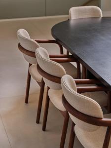 a black table with chairs and a black table at Seaside Villa by Brown Hotels in Trogir +150 photos