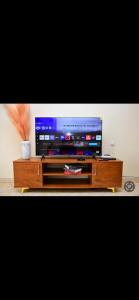 TV a/nebo společenská místnost v ubytování Peninsula Residence