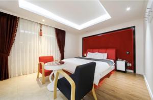 Postel nebo postele na pokoji v ubytování Hotel Zara Gwangju Cheomdan