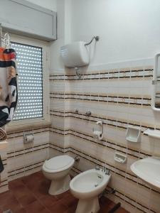 Koupelna v ubytování Piccolo Hotel Nuova gestione