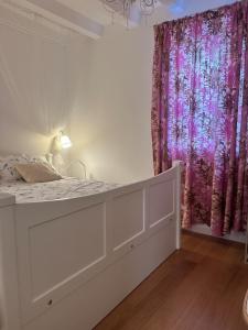 Un pat sau paturi într-o cameră la Apartment DB