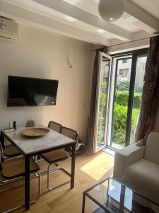 Un televizor și/sau centru de divertisment la Apartment DB