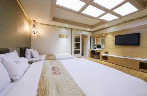 TV a/nebo společenská místnost v ubytování Hotel Zara Gwangju Cheomdan