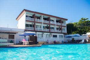 Bazén v ubytování HOTEL MELGAR PLAZA nebo v jeho okolí