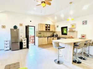 Kuchyň nebo kuchyňský kout v ubytování Private Village Resort + 38 fotografií