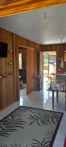 TV a/nebo společenská místnost v ubytování Casa de praia em garopaba sc