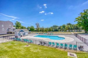 an image of a swimming pool in a yard at Oyster House Village --- 21503 Helm St in Rehoboth Beach