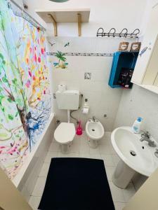 Koupelna v ubytování Carol Home