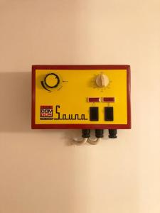 a switch on a wall with a lego train on it at Moja Stay - wyjątkowy dom z sauną in Niesulice