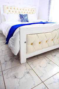 Ένα ή περισσότερα κρεβάτια σε δωμάτιο στο D&A Homes