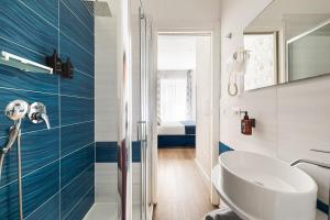 a bathroom with a sink and a shower at YourHome - Blue Marina Rooms in Sorrento