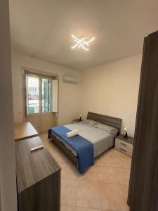 Postel nebo postele na pokoji v ubytování CasadiLollo