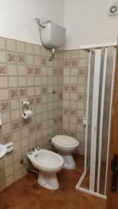 Koupelna v ubytování Piccolo Hotel Nuova gestione