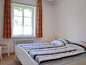 Postel nebo postele na pokoji v ubytování Haus am Deich