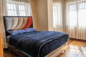 Postel nebo postele na pokoji v ubytování Nomad Hostel