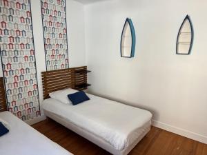 Posteľ alebo postele v izbe v ubytovaní Gîtes des Isles - Le Jersey
