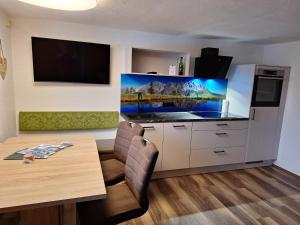 Kuchyň nebo kuchyňský kout v ubytování Ferienwohnung Weissacher