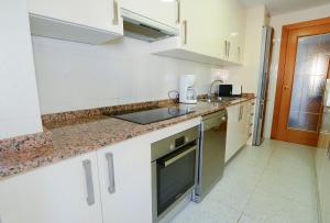 Kuchnia lub aneks kuchenny w obiekcie Calpe place