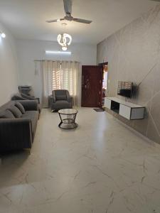 Posezení v ubytování Sukruthi service apartment