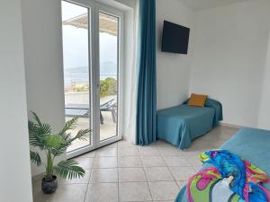 Postel nebo postele na pokoji v ubytování Villa Raf