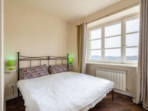 Ένα ή περισσότερα κρεβάτια σε δωμάτιο στο Apartment La Bordona by Interhome