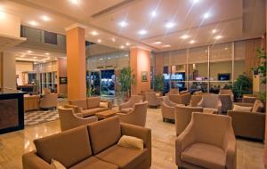 a waiting room with couches and chairs in a hospital at Club Hotel Sunbel in Beldibi