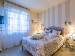 Ένα ή περισσότερα κρεβάτια σε δωμάτιο στο Apartment Saida by Interhome