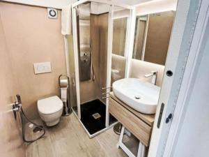 a bathroom with a sink and a toilet at Apartment Il Balconcino di Sorrento by Interhome in Sorrento