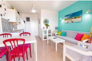a living room with a couch and a table at Ocean Bayview in Puerto Rico de Gran Canaria