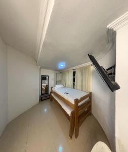 Postel nebo postele na pokoji v ubytování Hostal Viva Mar