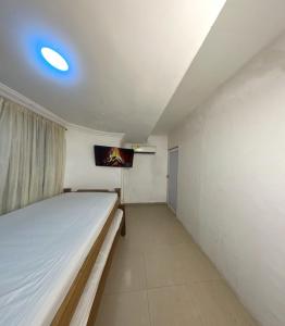 Postel nebo postele na pokoji v ubytování Hostal Viva Mar