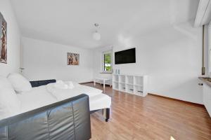 TV a/nebo společenská místnost v ubytování PEARL07 Appartement lumineux 2G