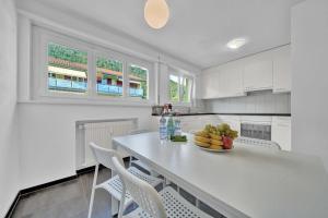Kuchyň nebo kuchyňský kout v ubytování PEARL07 Appartement lumineux 2G