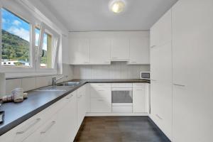 Kuchyň nebo kuchyňský kout v ubytování PEARL07 Appartement lumineux 2G